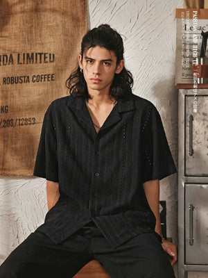 Men's High-End Hollowed-Out Cuban Collar Short Sleeve Shirt - Black - Model Sitting Pose